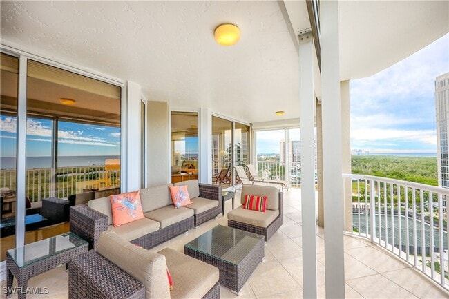 Building Photo - 7117 Pelican Bay Blvd Unit 1101
