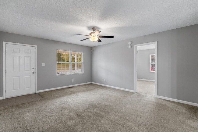 Photo - SW - Like New Home! Newer SS Appliances & Cabinets, Ceiling Fans, Blinds, Front Porch and Deck. M...