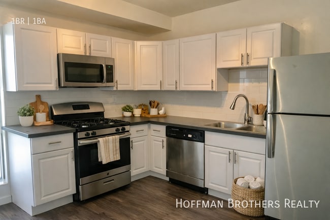 Building Photo - 151 N Hoover St Unit 12