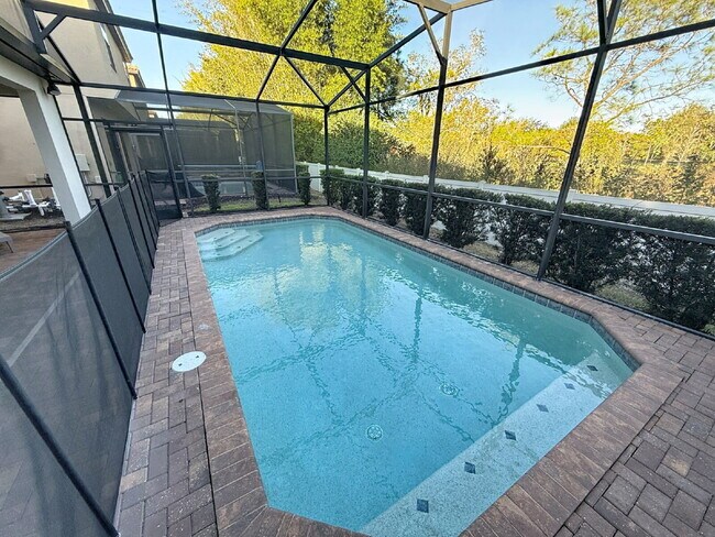 Photo - Welcome home to the fully furnished 5-bedroom, 5.5-bathroom private pool home located in Windsor ...