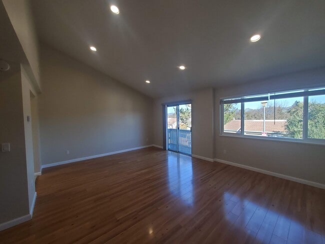 Building Photo - Private 2x2 Santa Rosa Townhouse with pool, 2-car garage, workshop area, fireplace, W/D Hookups