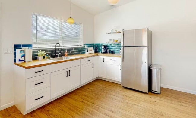 Building Photo - 3201 N Cherry Ave Unit 3201