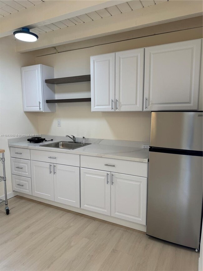 Building Photo - 630 SW 62nd Ct Unit 2 Rental