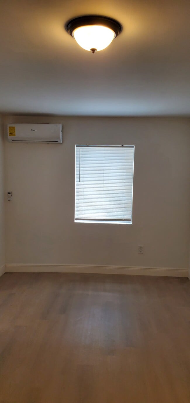 Building Photo - 3120 NW 22nd Ave Unit OJM RR Corp Rental