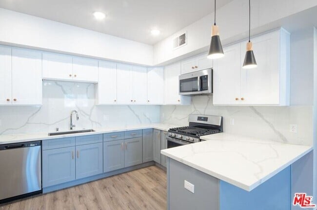 Building Photo - 3672 Jasmine Ave Unit 203 Rental