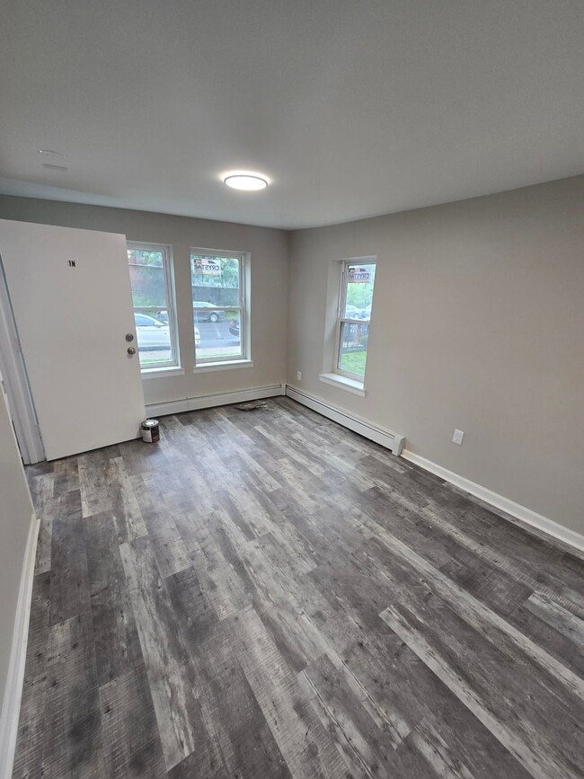 Photo - ? Modern Comfort: 3-Bedroom Living in Hartford’s Friendliest Area ? Unit 1S