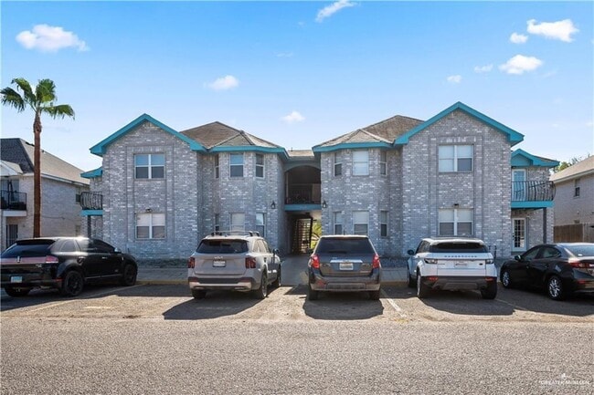 Building Photo - 13 Oasis Dr Unit 207