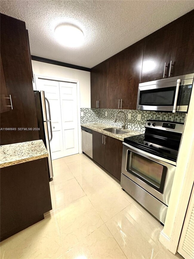 Photo - 919 NE 199th St Unit 104