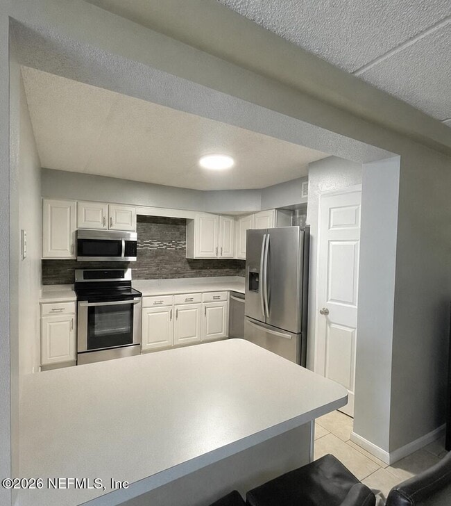 Building Photo - 3401 Townsend Blvd Unit 209