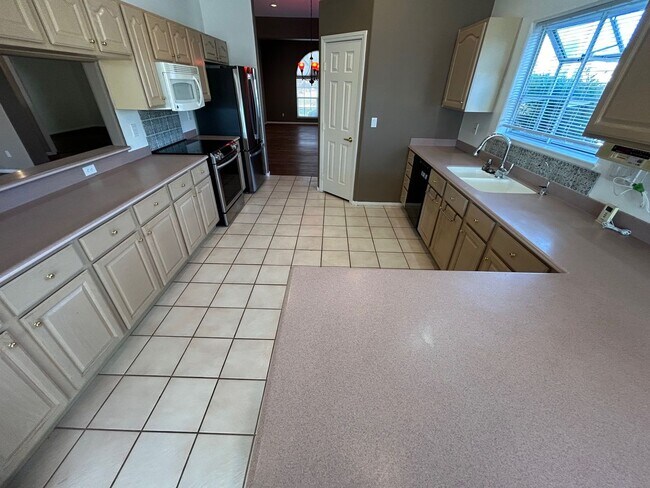 Photo - LIMITED TIME ONLY: MOVE IN SPECIAL,,,, STUNNING COUNTRY CLUB HOME – 3 BED / 2 BATH | GUARD-GATED ...