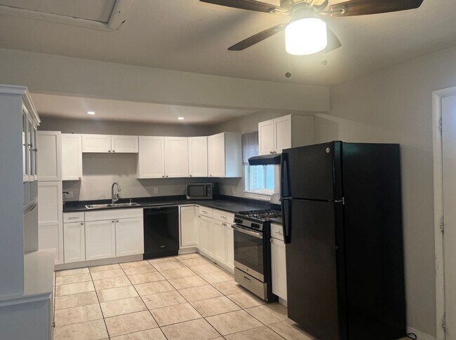 Building Photo - 945 Van Gordon St Unit 945A