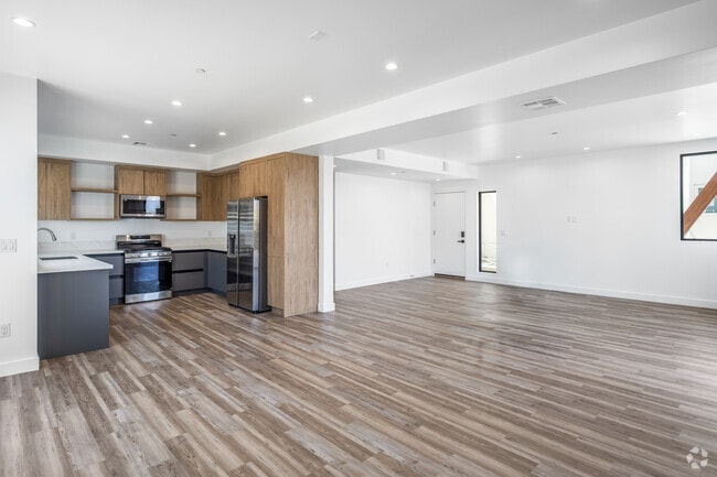 105A 3BR, 3BA - 1,950SF - Kitchen and Living Room