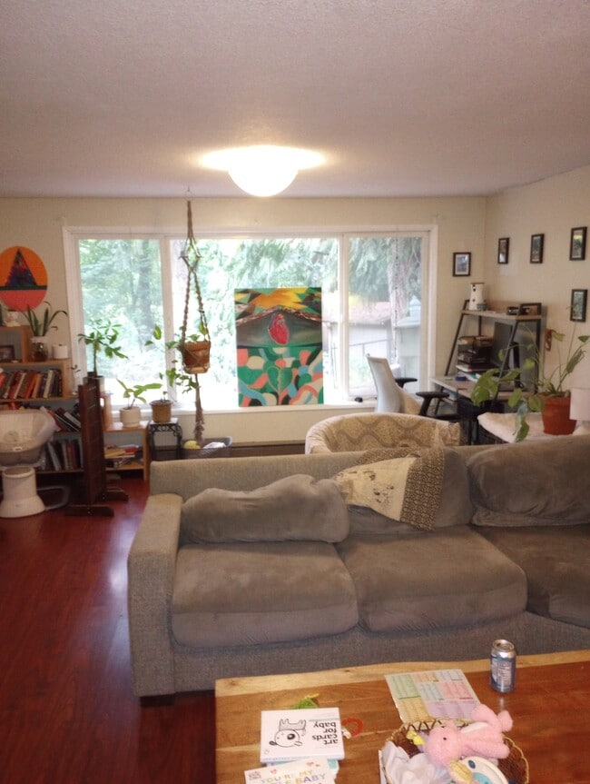 Other side of living room - 2050 SW Pheasant Dr Unit Daylight basement apt