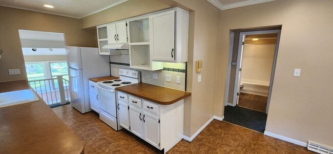 Photo - Beautiful home with attached garage and great yard!