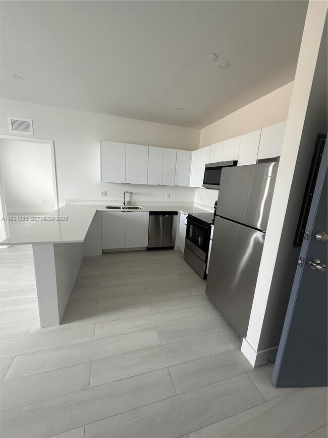 Photo - 1091 E 17th St Unit 402