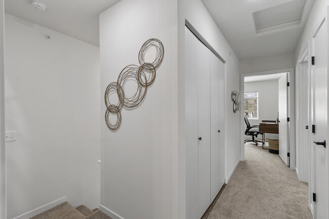 Upstairs Hallway in 3-Bed Unit - Pine Creek Apartments