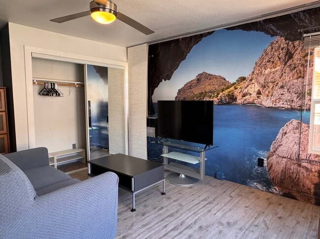 New couch cover (still a pull out sofa bed) - photo taken May 21 2025. More new photos soon! - 1045 1/2 Sanborn Ave