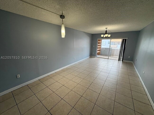 Building Photo - 6095 W 18th Ave Unit S330