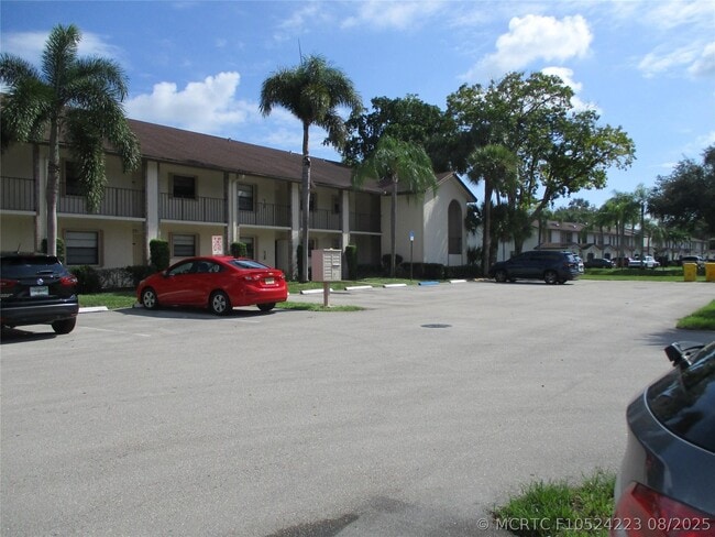 Building Photo - 23442 SW 57th Ave Unit 406