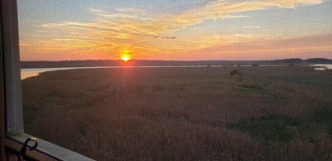 Sunset from Screened Balcony - 91 Screven St Unit Darien Delight