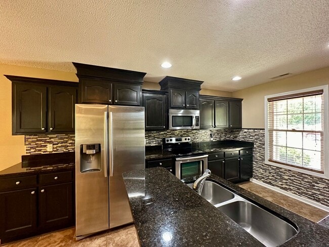 Photo - Large Fenced Yard in Saddlebrook Subdivision!