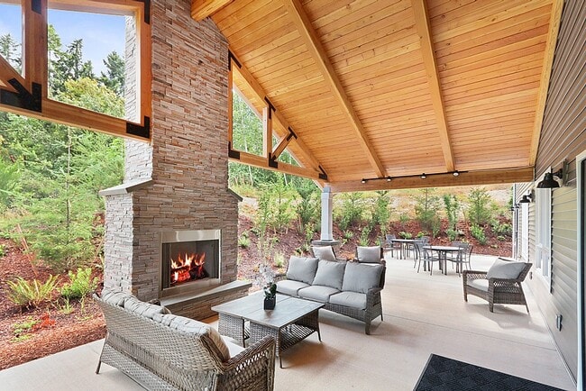 Community Center patio with lovely stacked stone fireplace.