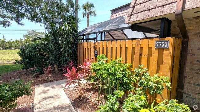 Building Photo - 7753 Courtyard Run W Rental