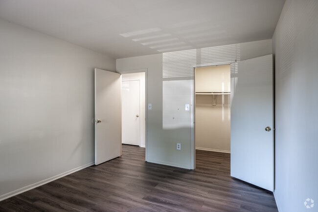 2BR, 1BA - 880SF - Primary Bedroom - Treetops