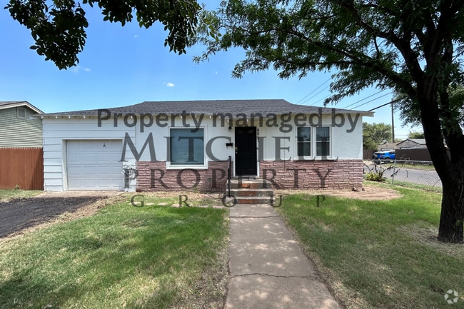 Building Photo - Welcom to 4017 S. Hughes! 2 bedroom with a... Rental