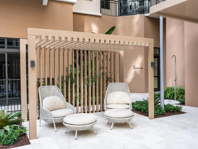 Lounge in luxury with plush daybeds made for all-day relaxation. - Modera Academical Village