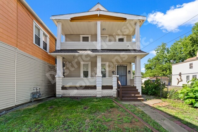 Building Photo - 8302 Sowinski Ave Unit Upper