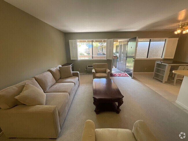 Building Photo - Available Now is a Beautiful Condo Located... Unit 86