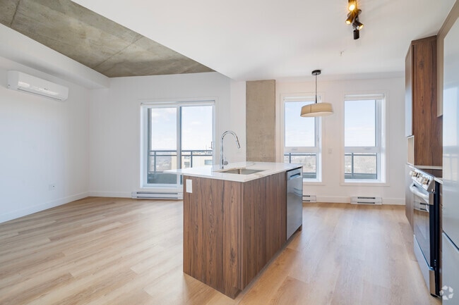 1BR, 1BA - 589SF - Kitchen - Le Loyal – condos locatifs
