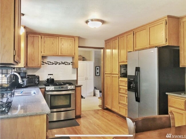 Photo - Open, bright and roomy with private backyard