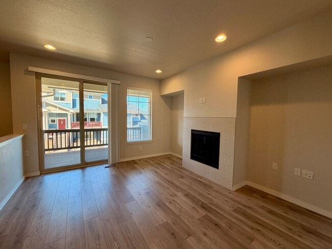 Photo - Move-In Ready 3-Story Townhome with Loft & 2-Car Garage