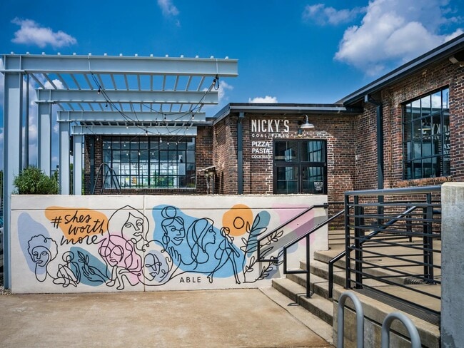 Savor wood-fired pizza at Nicky’s Coal Fired—just steps from Modera Nations in your vibrant new neighborhood.