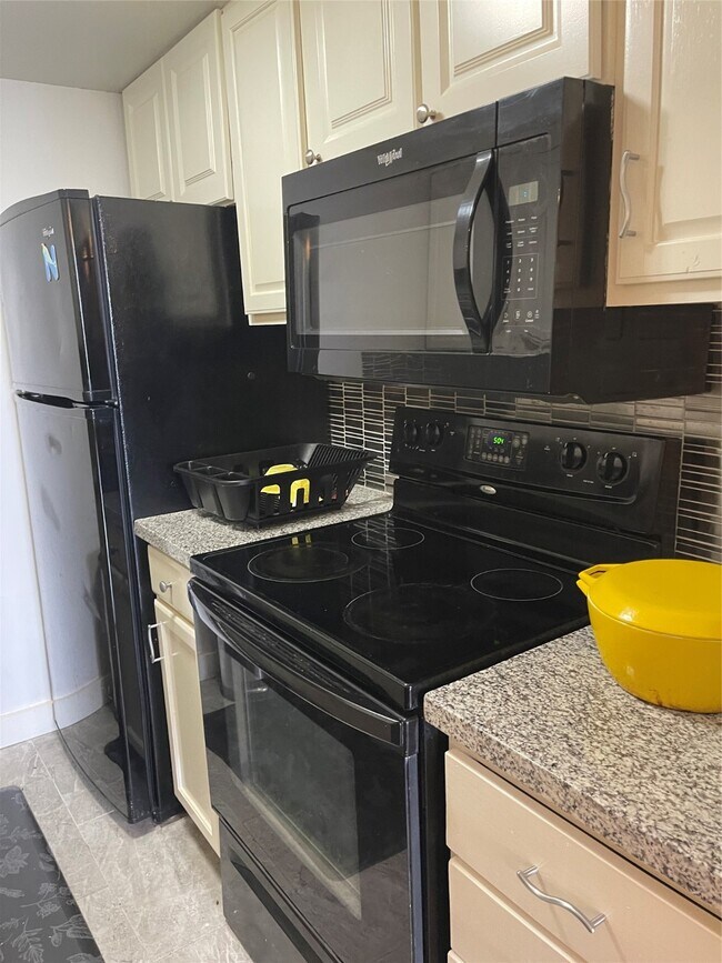 Building Photo - 7510 Hornwood Dr Unit 1407 Rental