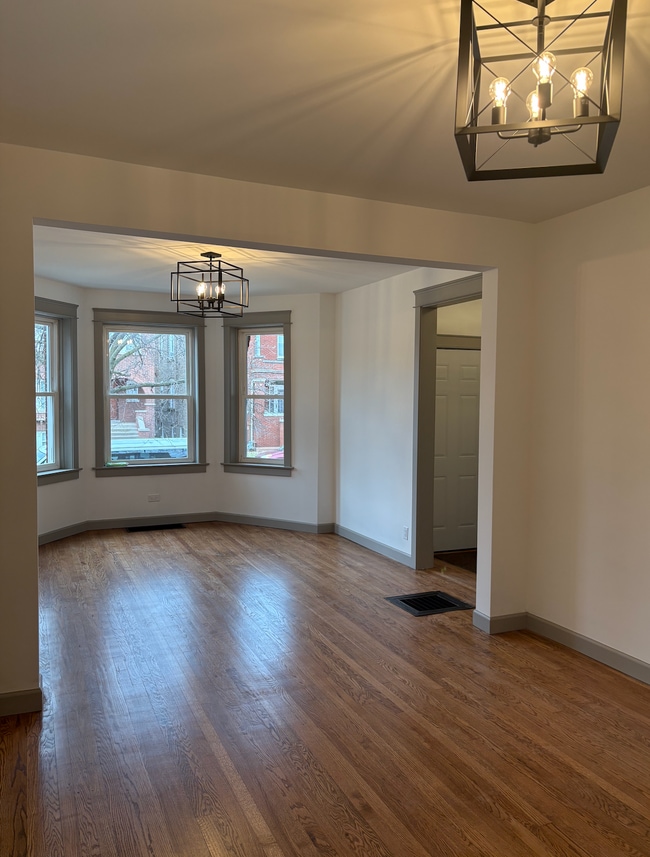 Building Photo - 2215 Elmwood Ave Unit 1st Floor