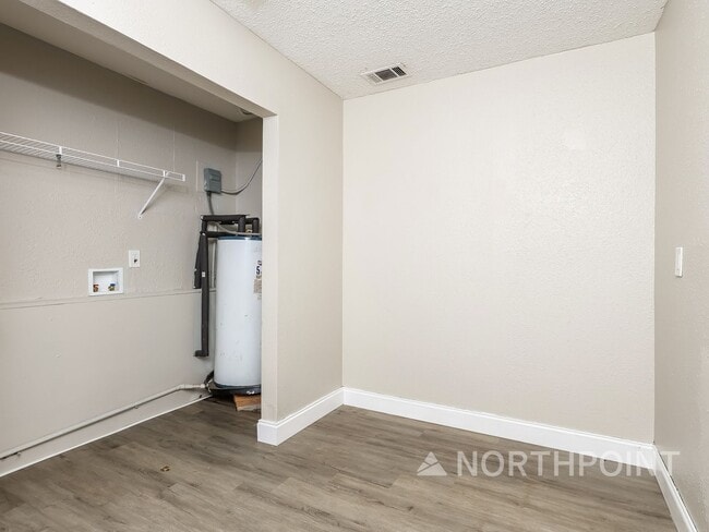 Photo - 3 BR/1BA | Newly Renovated Single Family Home | Screened in Patio and carpot | Huge backyard!