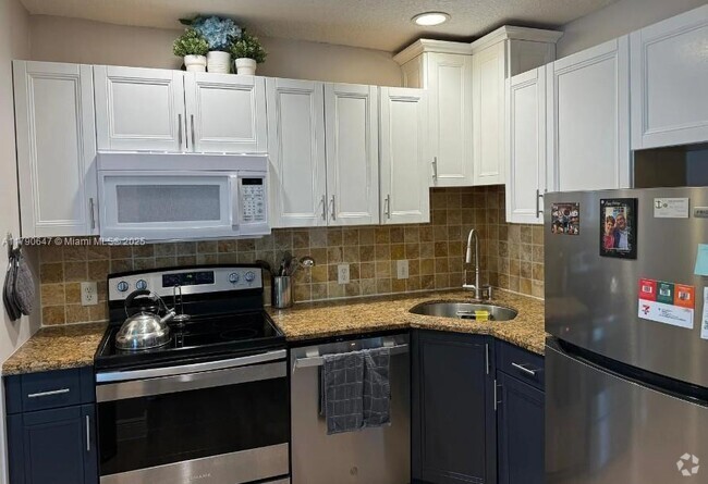Building Photo - 11789 NW 30th St Unit 203A Rental