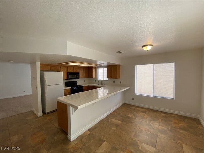 Building Photo - 9633 Rancho Palmas Dr Rental