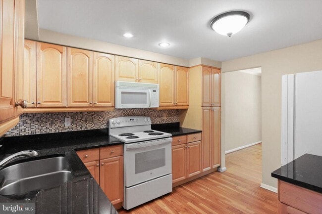 Photo - Spacious 3 bed and 3.5 bath end unit town house nestled on a quiet street in highly sought after ...