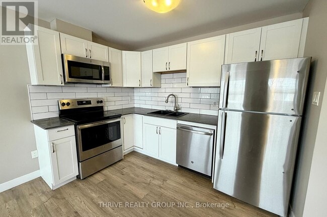 Photo - 1277 Commissioners Rd W Unité 202