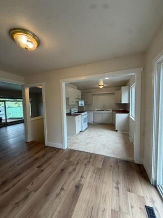 Photo - Spacious 5 Bedroom Home Near UNC with Large Yard & Off-Street Parking