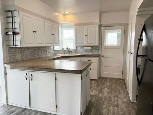 Photo - Charming 2-Bedroom Home with Character & Spacious Yard