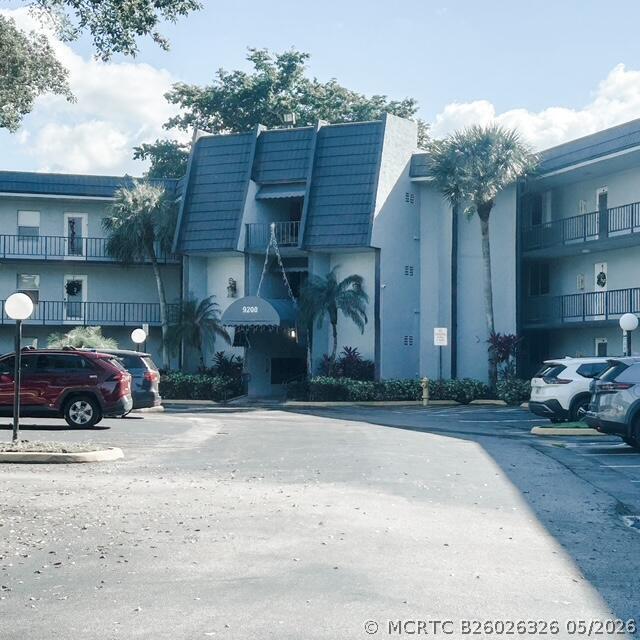 Building Photo - 9200 Lime Bay Blvd Unit 312