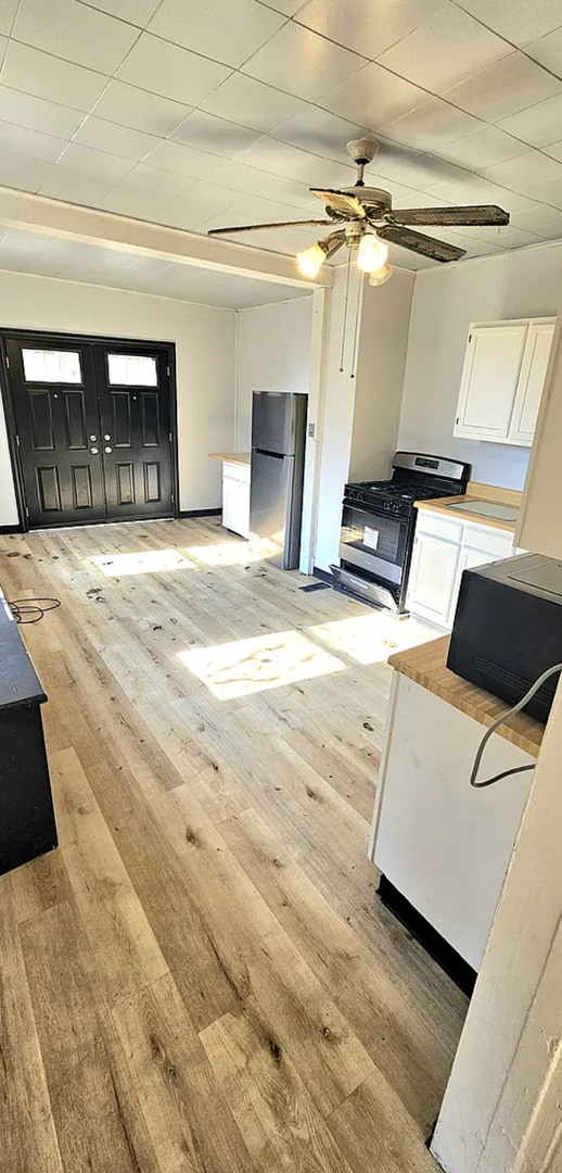 Building Photo - Spacious 4-Bedroom Home with 3-Car Garage, Deck & More!!