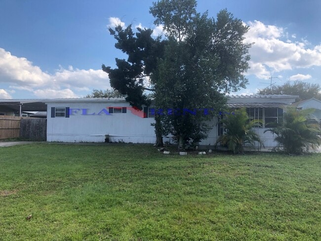 Building Photo - **3/1 Manufactured Home in Charlin Parkway area with large fenced yard**