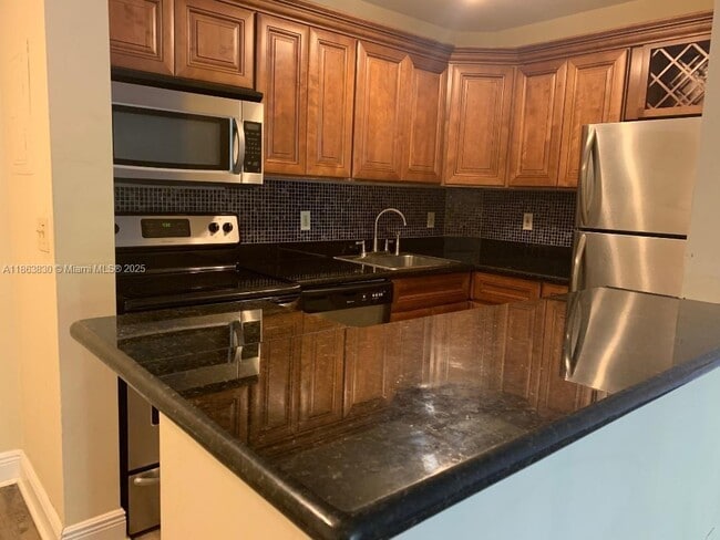 Building Photo - 10725 Cleary Blvd Unit 210 Rental