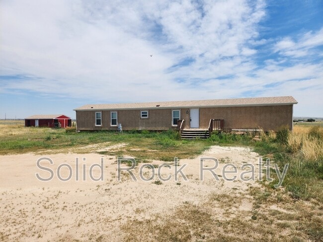 Building Photo - 9835 N Log Rd Rental
